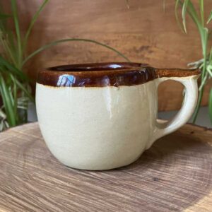 A solid, made in the USA, two-tone lakeside style cottage coffee mug. Part of ADKation Life’s Cottage Classic vacation gift collection. Fueling those Adirondack senses at home, camp, cottage and workspace.