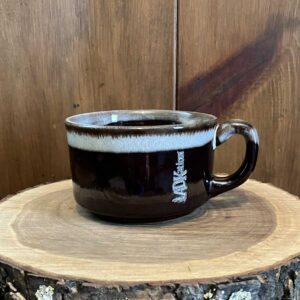 Resembling a view of the Northern Lights in a night sky, this ADK vacation gift mug with the text ‘ADKation’ keeps users connected to memorable vacations enjoyed in the Adirondack Mountains of New York.