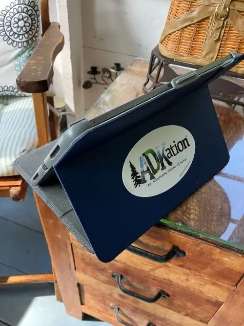 iPad case with an Adirondack vacation sticker displaying the text "ADKation" is a perfect ADK vacation souvenir for family and vacation guests.