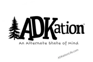 ADKation Life | Oval Adirondack vacation sticker featuring the fun ‘ADK’ and ‘vacation’ word mash up, ‘ADKation.’ | Simple black & white design adds a clean look to your personal gear, keeping that ADK vacation state of mind fresh and fired up.