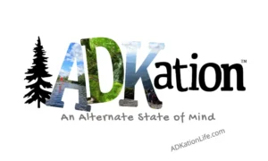 ADKation Life | Car window sized oval Adirondack vacation sticker featuring the fun ‘ADK’ and ‘vacation’ word mash up, ‘ADKation.’ | Adirondack Park images fill the letters ‘ADK.’ | This large ADK vacation sticker is part of our ForeverBlue line, where $2 of the purchase price will go toward supporting local efforts to help maintain the Adirondack outdoor experience.